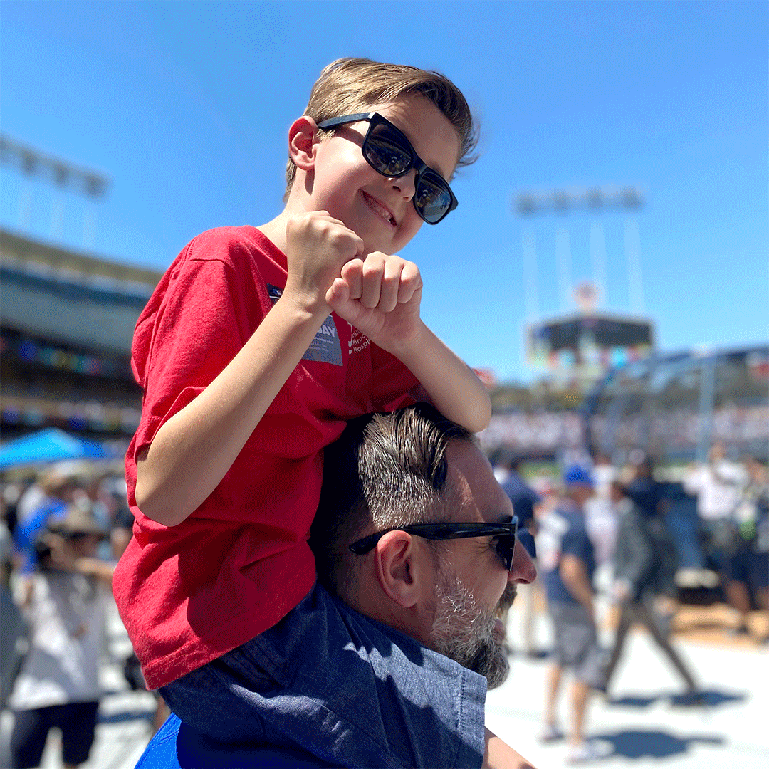 Elliot at the All-Star game on his father's shoulders