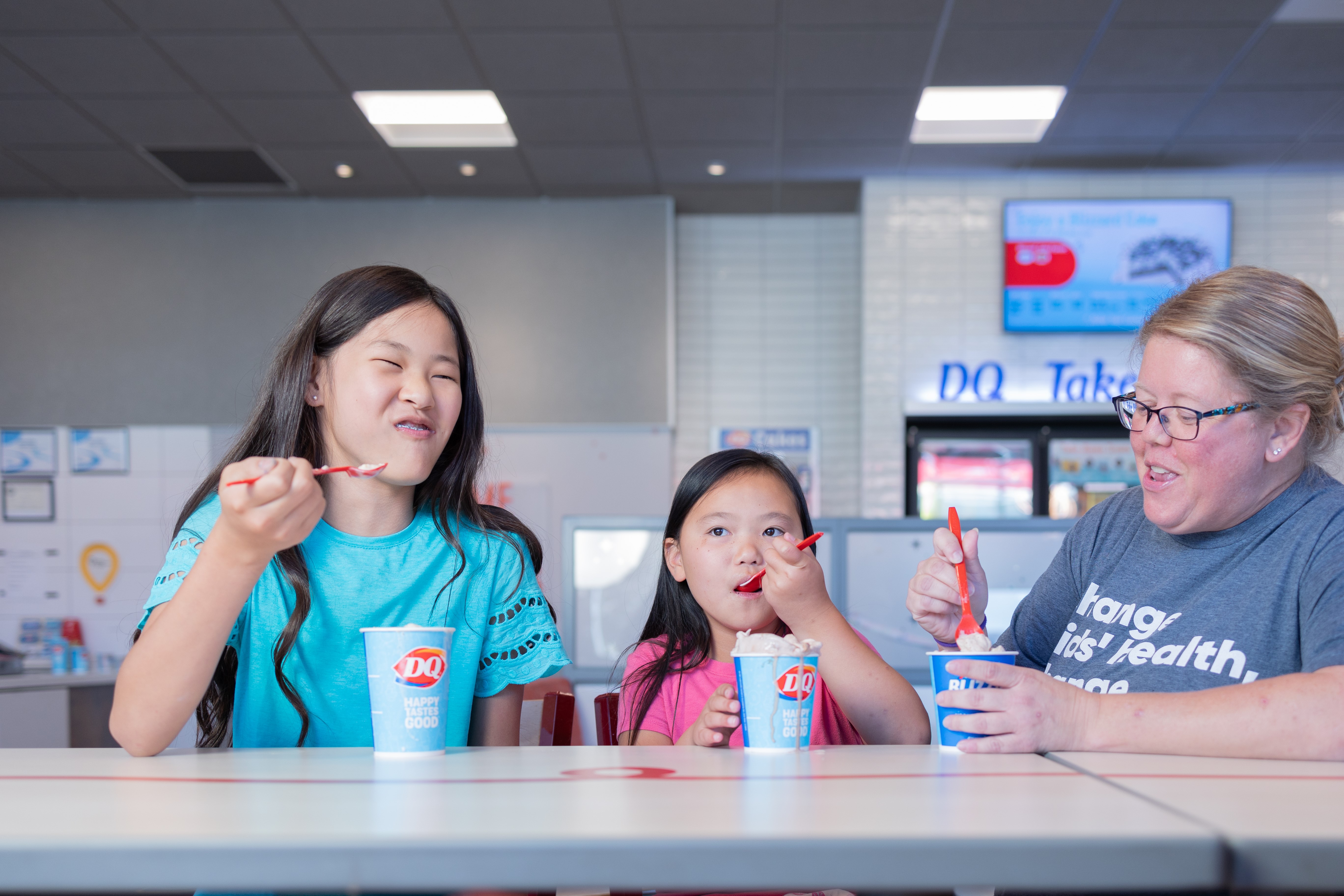 Two children enjoying a DQ Blizzard Treat